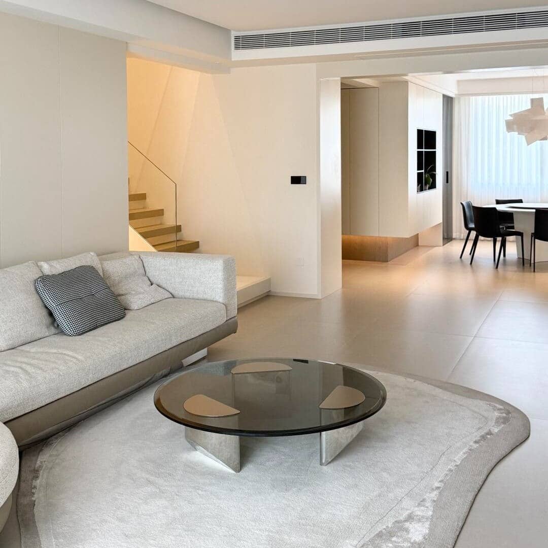 2. Minimal Modern Living Room with Subtle Ambient Illumination - lighting ideas for living room