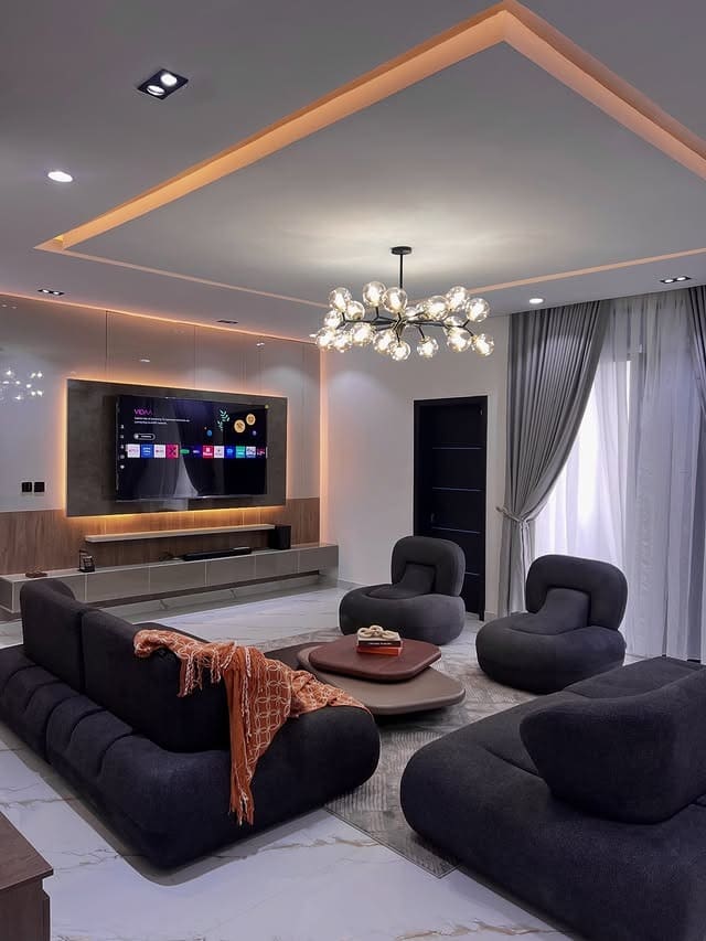 6. Contemporary Lounge with Under-Cabinet and Perimeter Lighting - lighting ideas for living room