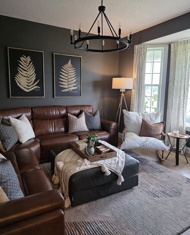 7. Cozy Leather Living Room with Warm Floor and Wall Lighting - lighting ideas for living room