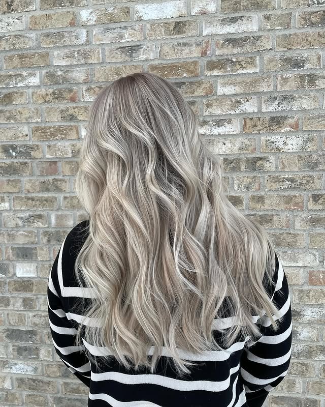 1. Soft Icy Blonde Waves with Dimensional Highlights - Hair Color with Highlights
