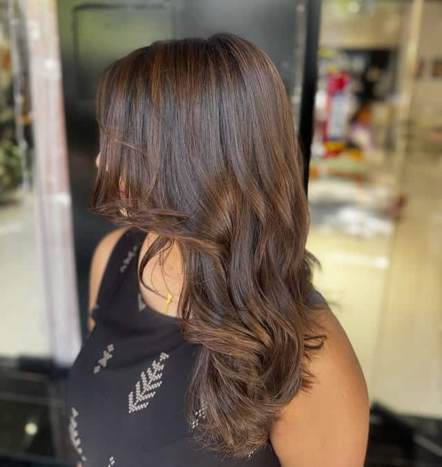 9. Rich Caramel Brown Layers with Gentle Movement - Hair Color with Highlights