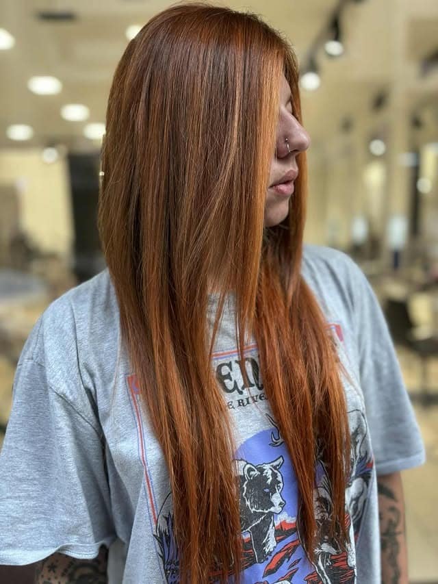10. Vibrant Copper Straight Layers with Light Detail - Hair Color with Highlights