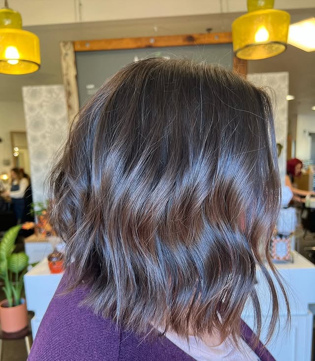 5. Glossy Chestnut Wavy Bob - Chic-Length Hairstyles