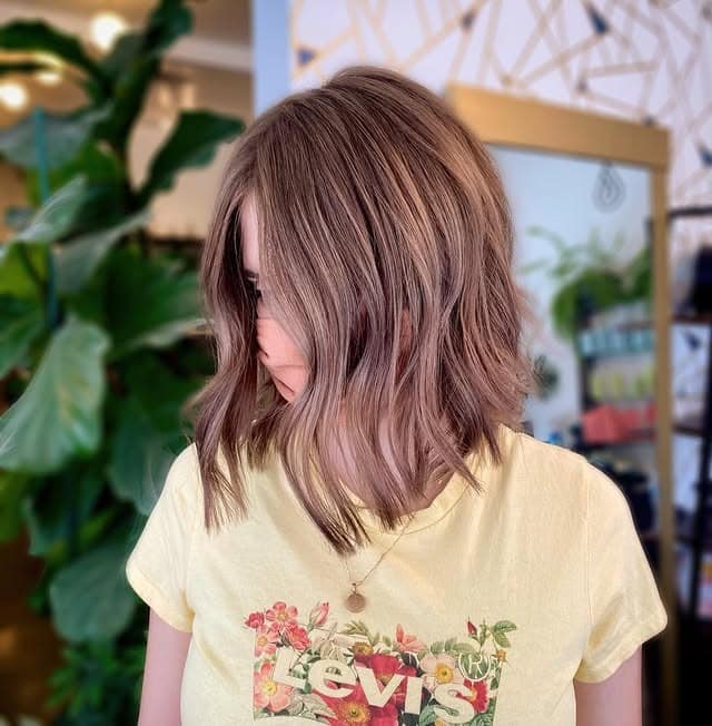 7. Muted Rosewood Wavy Lob - Chic-Length Hairstyles