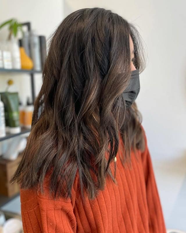 11. Deep Brunette Layered Waves - Chic-Length Hairstyles