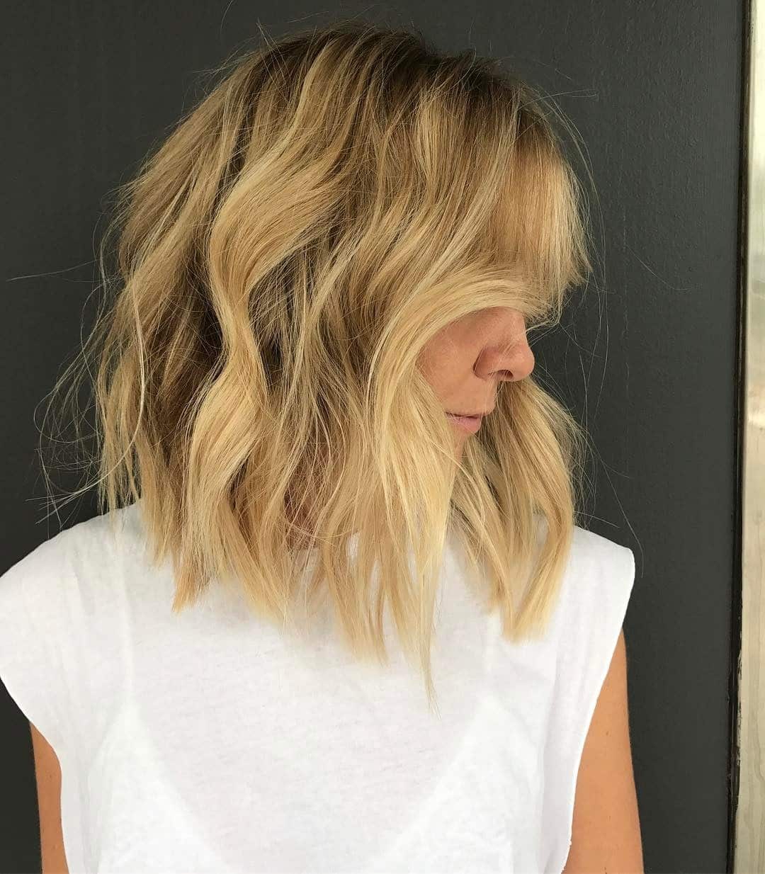 14. Golden Tousled Lob with Fringe - Chic-Length Hairstyles