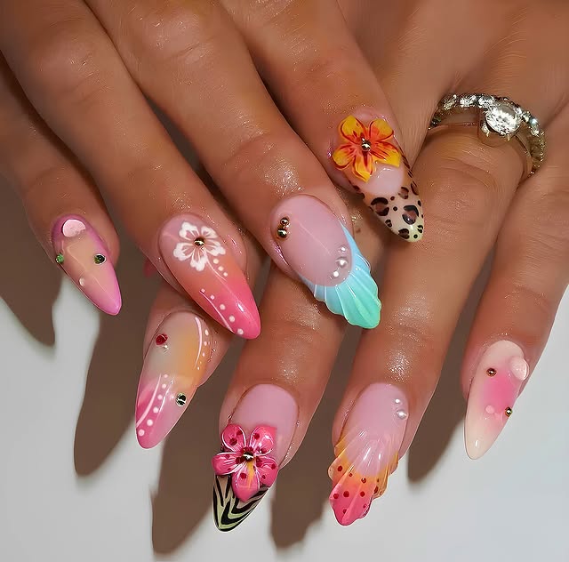 3. Vibrant Tropical Florals with Mixed Art Accents - girly nail ideas
