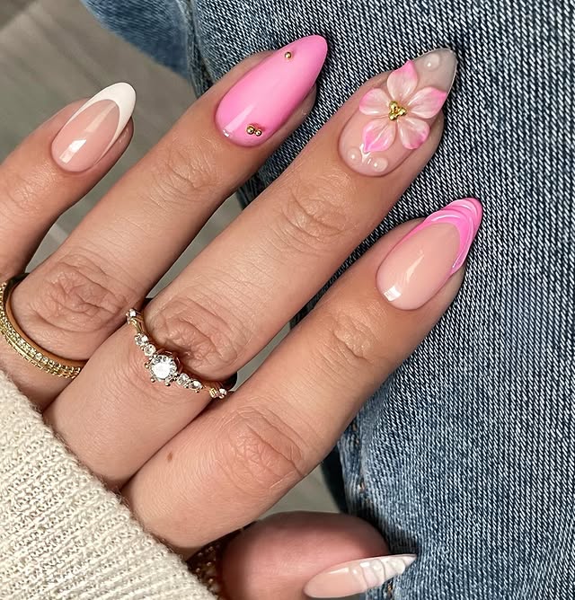 14. Mixed Pink Almond Nails with Floral Accent - girly nail ideas