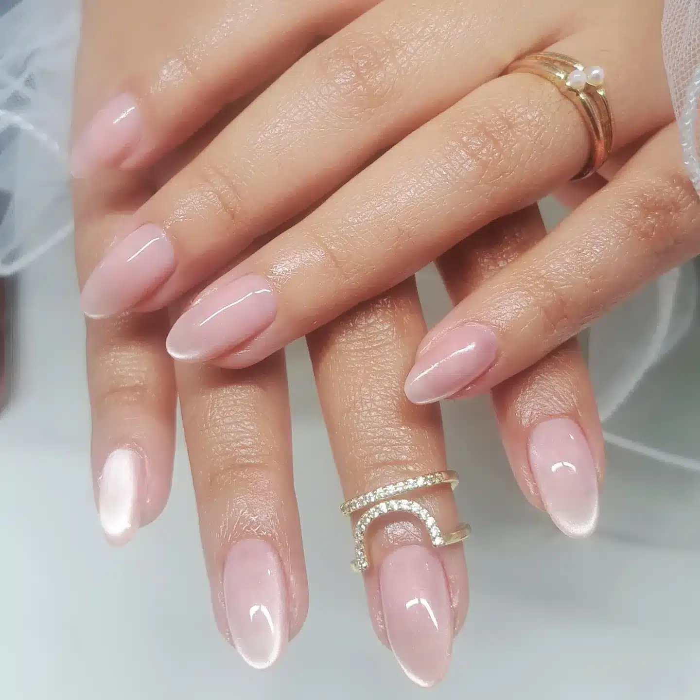 1. Soft Pink Glow Glass Nails - glass nail ideas