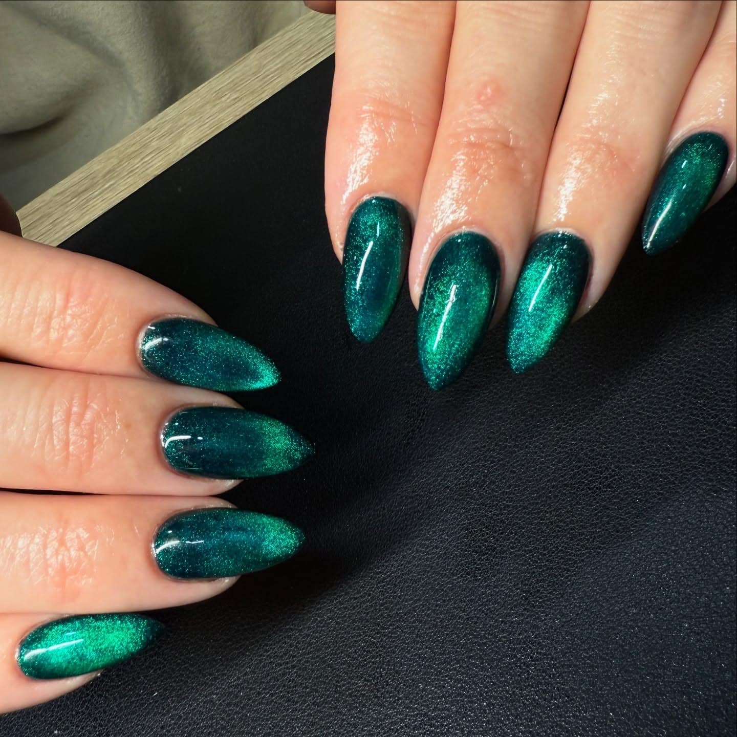 5. Emerald Shimmer Glass Nails - glass nail ideas