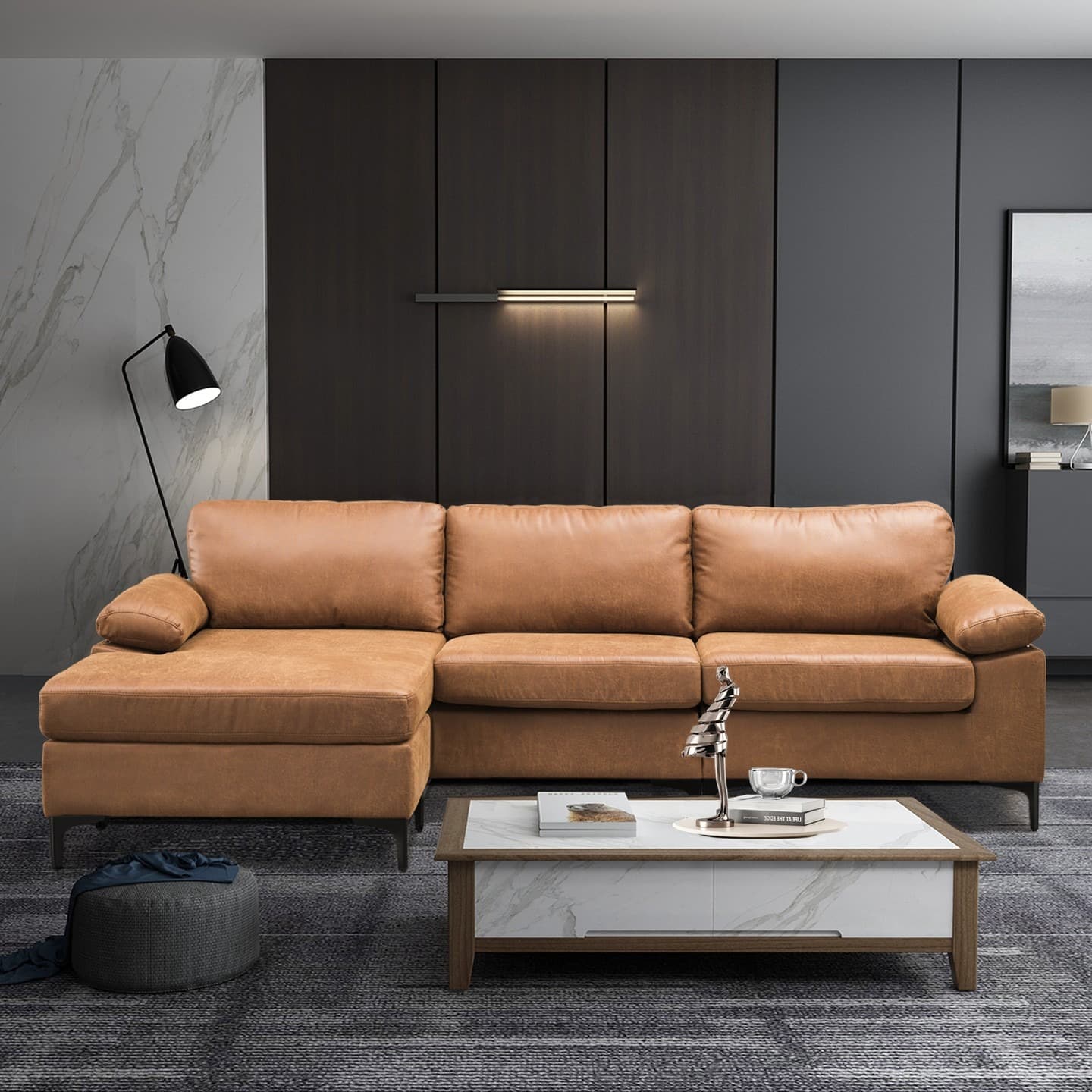 3. Butterscotch Sectional Against Charcoal Panelling - dark brown living room ideas