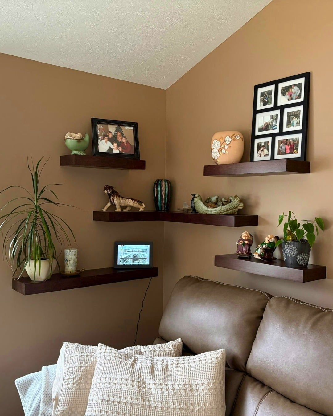 4. Compact Corner Display in Earthy Browns - dark brown living room ideas