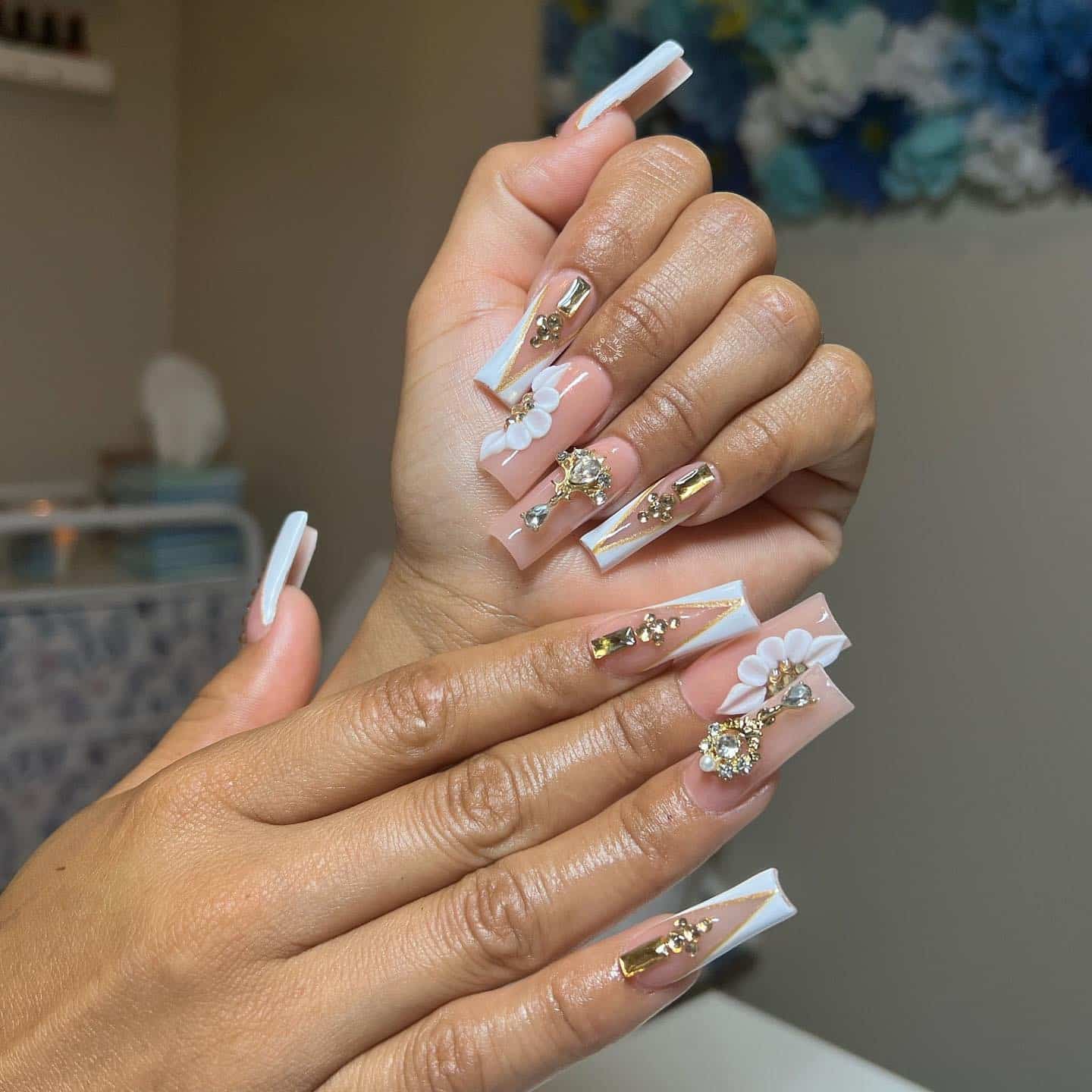 6. Structured White Stripes with Gold Gem Clusters - gold and white nail ideas