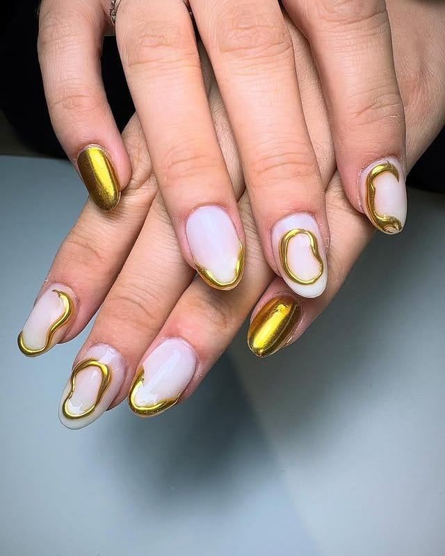 9. Molten Gold Edge Frames - gold and white nail ideas