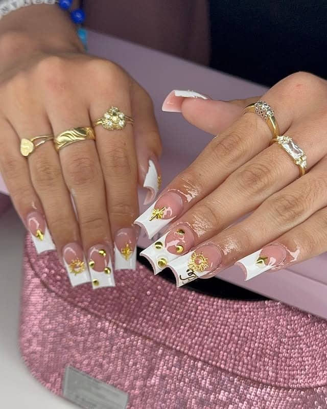 12. Celestial White French with Gold Charms - gold and white nail ideas