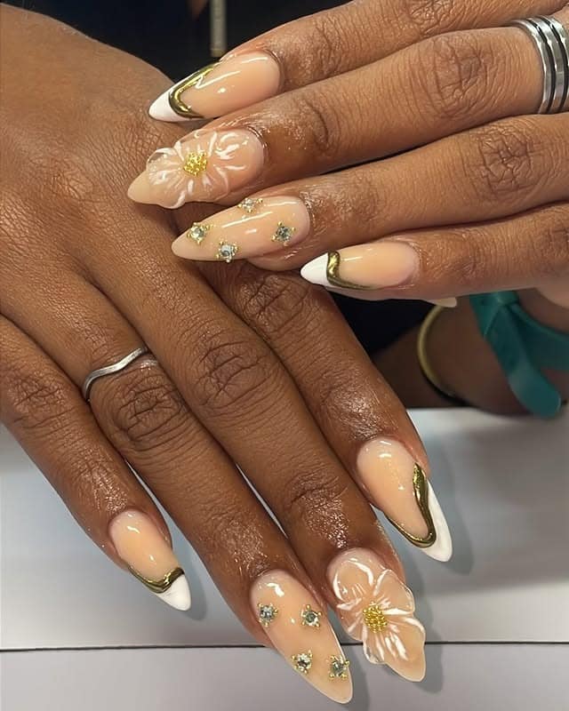 16. 3D Floral Almond with Gold Frames - gold and white nail ideas