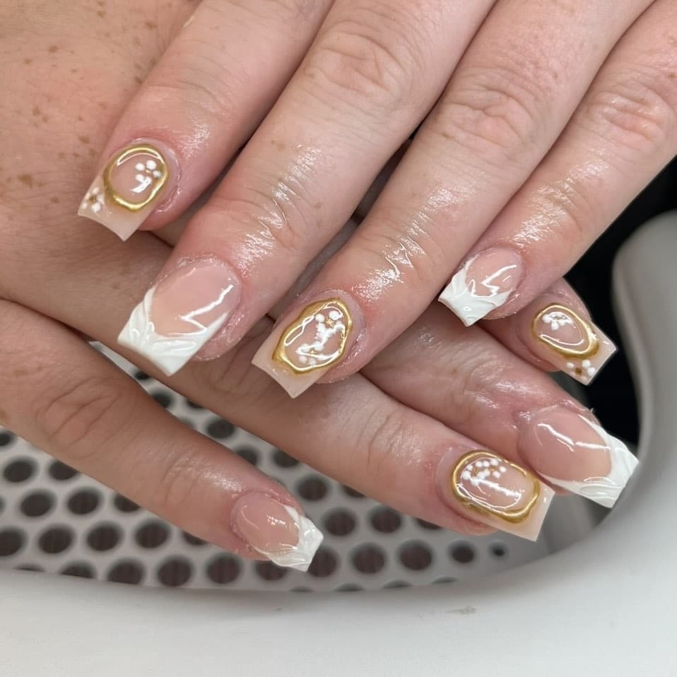 17. White Textured French with Gold Framed Centers - gold and white nail ideas