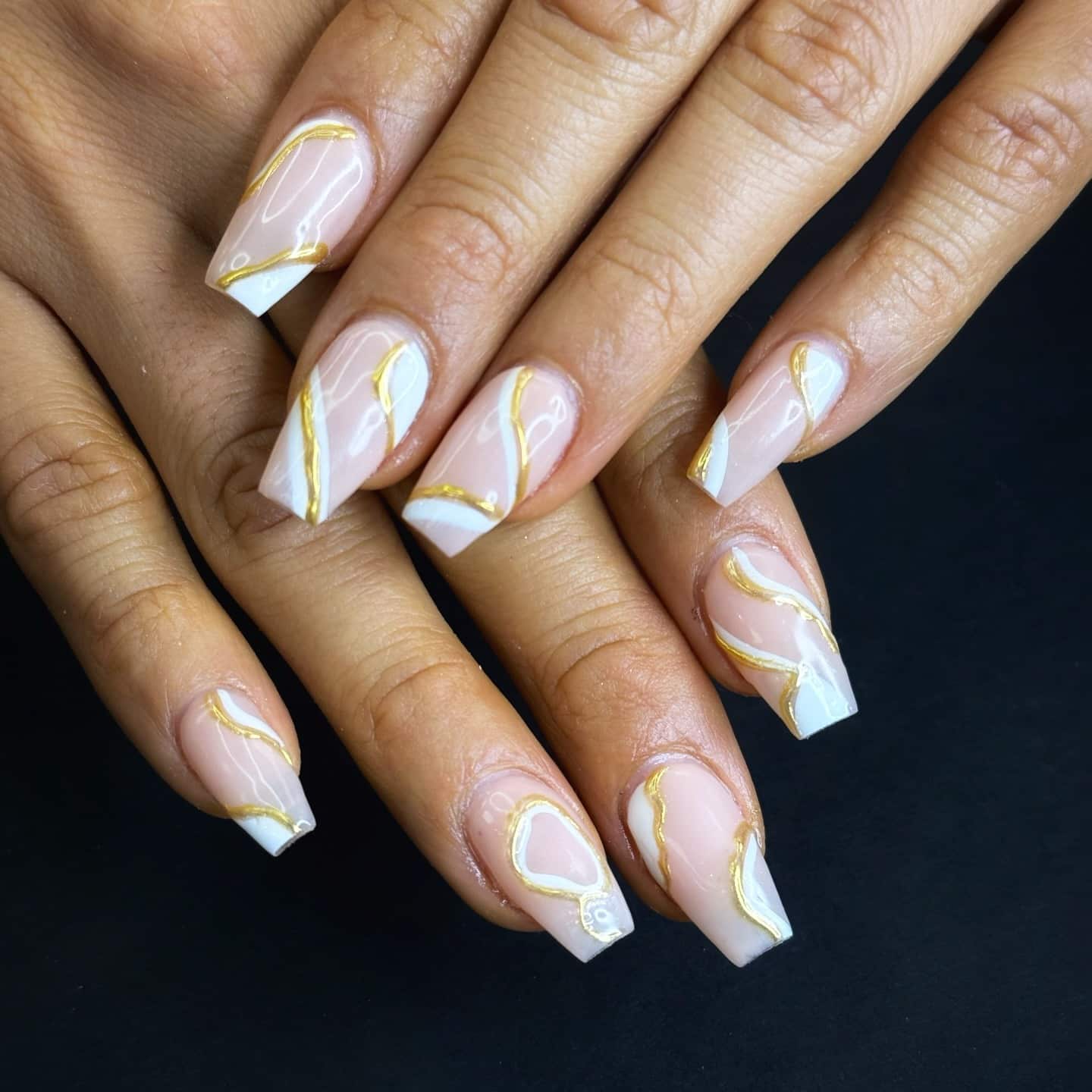 21. Glossy White Wave Nails with Gold Lining - gold and white nail ideas