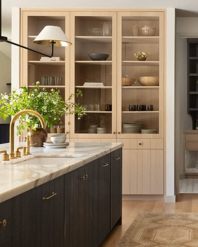 1. Light Oak Display Cabinetry with Soft Neutrals - kitchen ideas with shelves