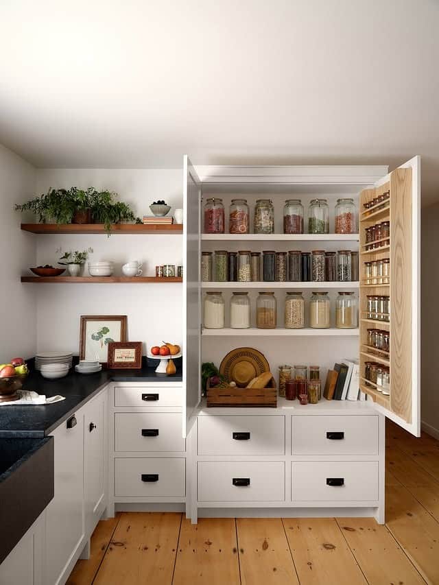 3. Crisp White Pantry Shelves with Glass Jars - kitchen ideas with shelves