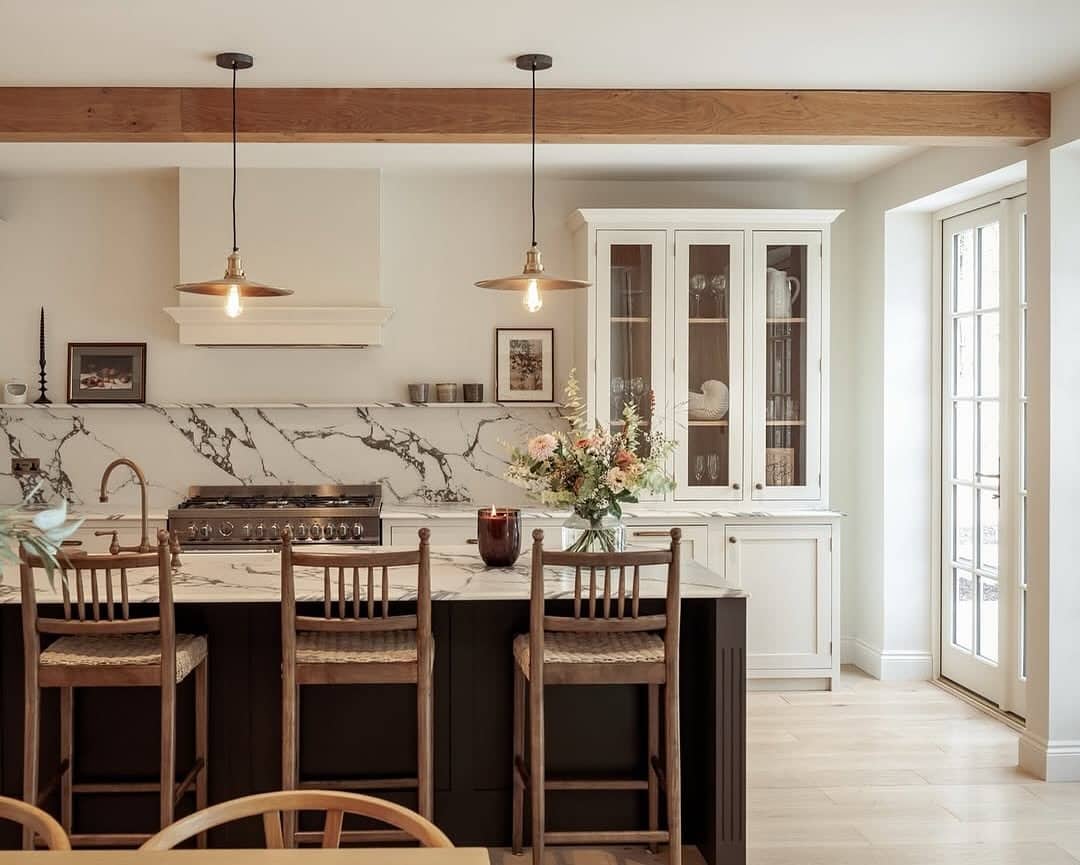 6. Creamy Cabinetry and Textured Marble Shelving Moment - kitchen ideas with shelves