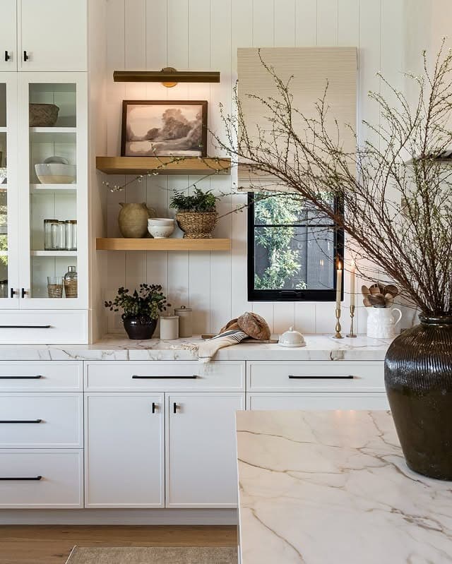 17. Marble Countertops with Warm Wood Floating Shelves - kitchen ideas with shelves