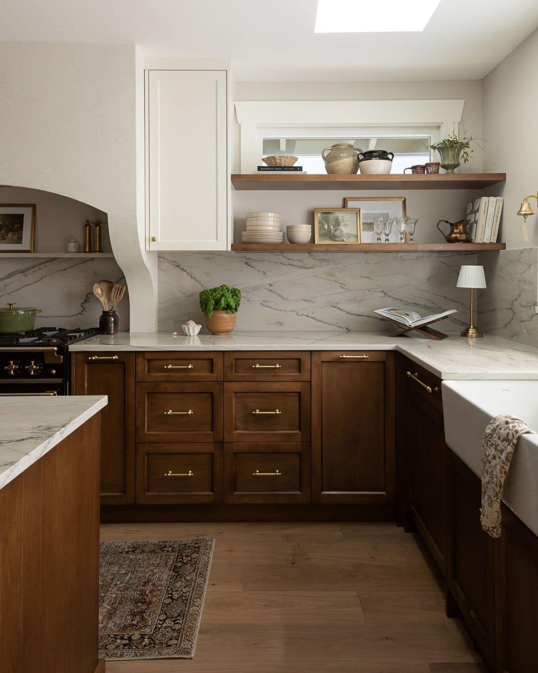 22. Warm Walnut Cabinets with Stone-Backed Shelving - kitchen ideas with shelves