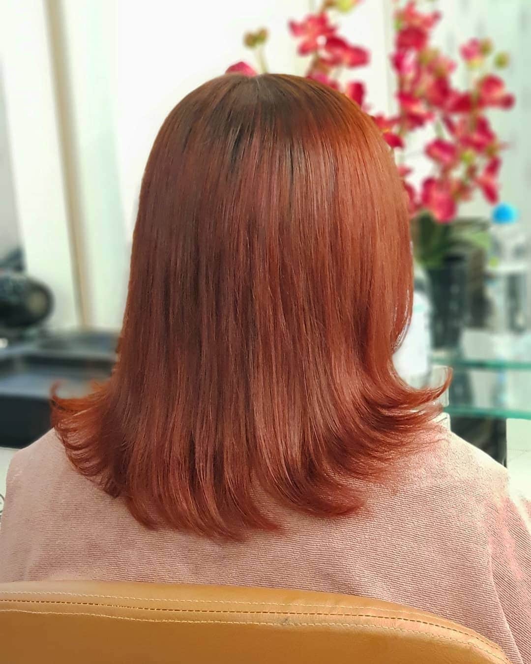 3. Sleek Blunt Lob with Polished Auburn Finish - Dark Auburn Hair Color