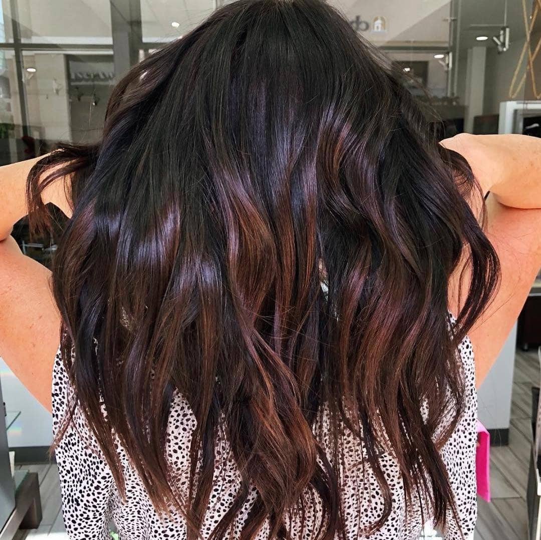 8. Glossy Dark Auburn with Subtle Highlights - Dark Auburn Hair Color