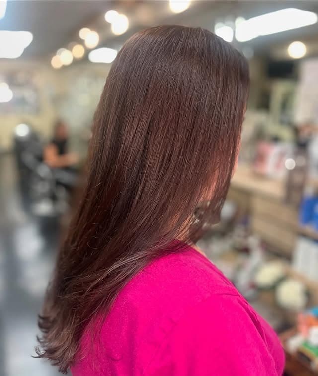 16. Glossy Long Layers in Dark Auburn - Dark Auburn Hair Color