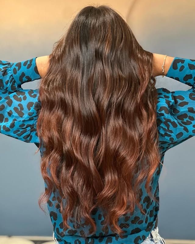 20. Long Soft Waves with Auburn Highlights - Dark Auburn Hair Color