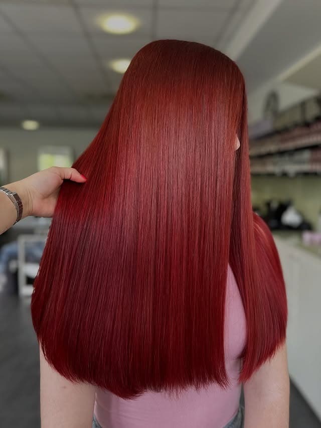 10. Rich Auburn Red with Sleek Precision - Red Hair Color