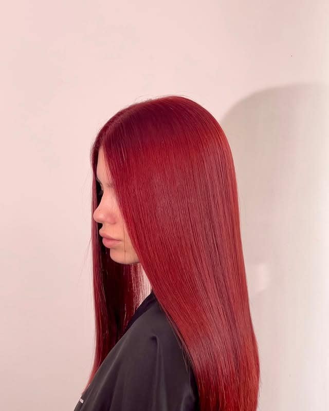 14. Smooth Crimson Red Long Cut - Red Hair Color