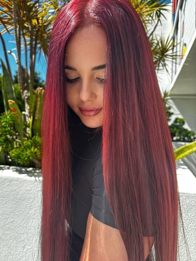 21. Sleek Garnet Red Ultra-Long Length - Red Hair Color
