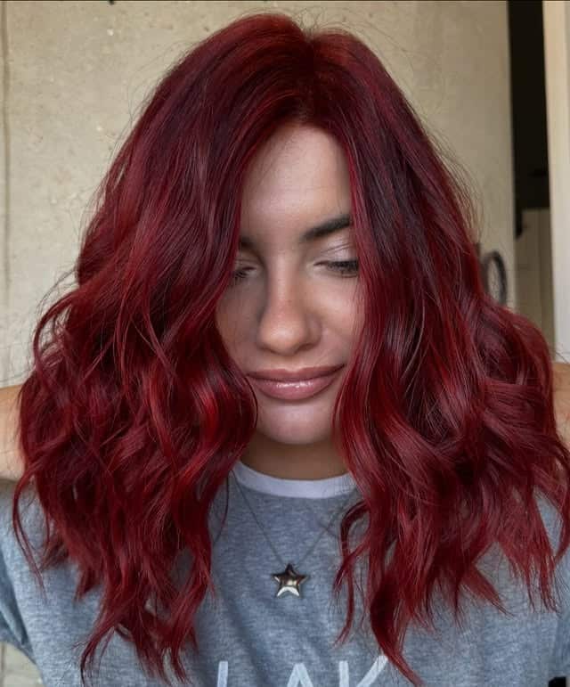 22. Textured Crimson Red Shoulder-Length Waves - Red Hair Color