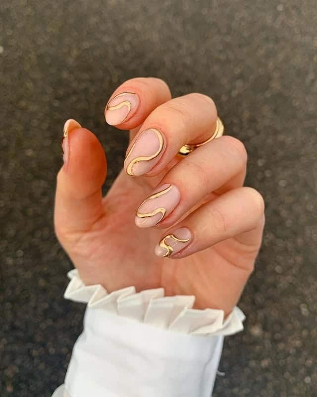8. Natural Nails with Sculpted Gold Line Art - gold foil nail ideas