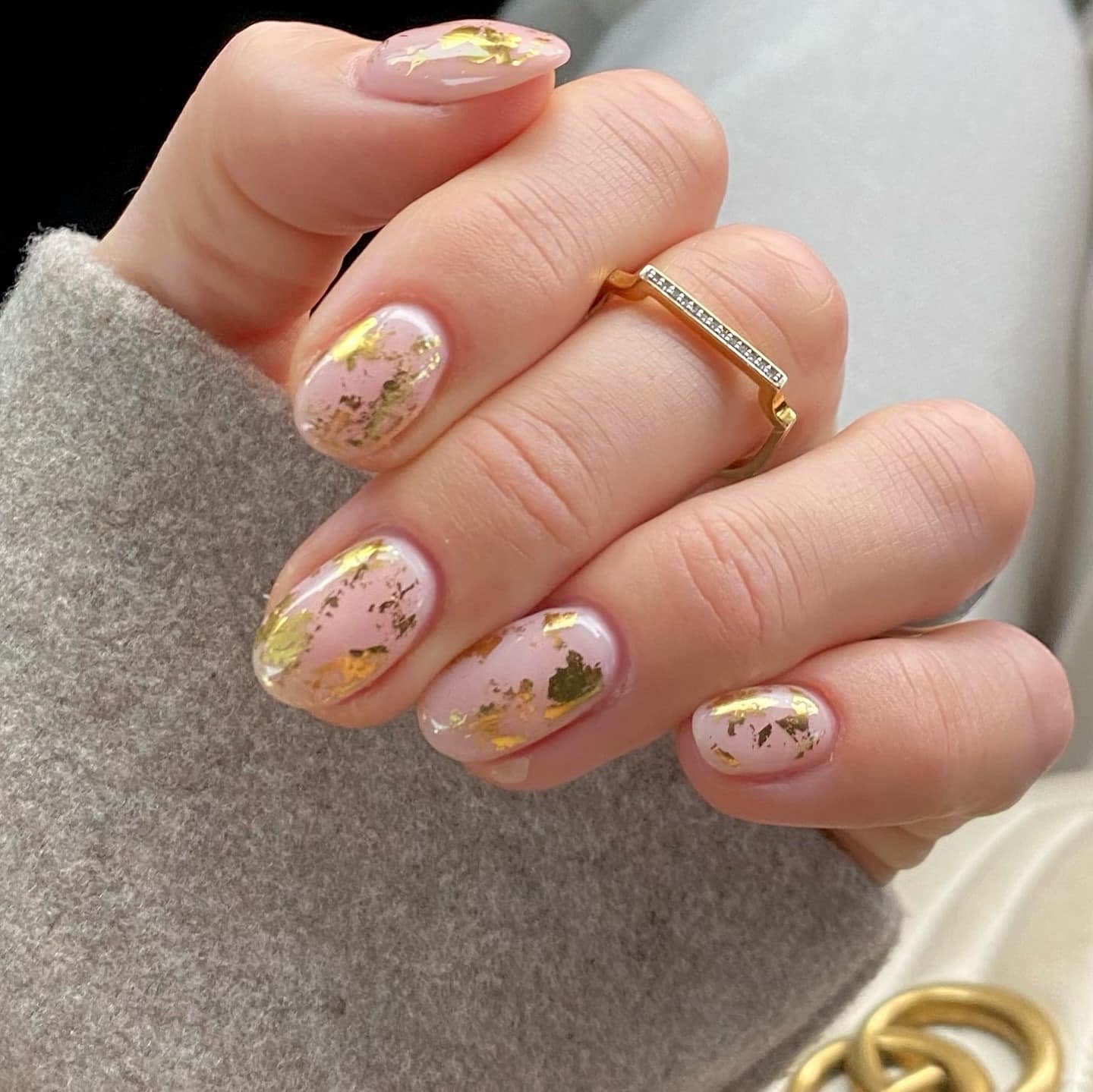 15. Soft Pink Nails with Floating Gold Foil - gold foil nail ideas