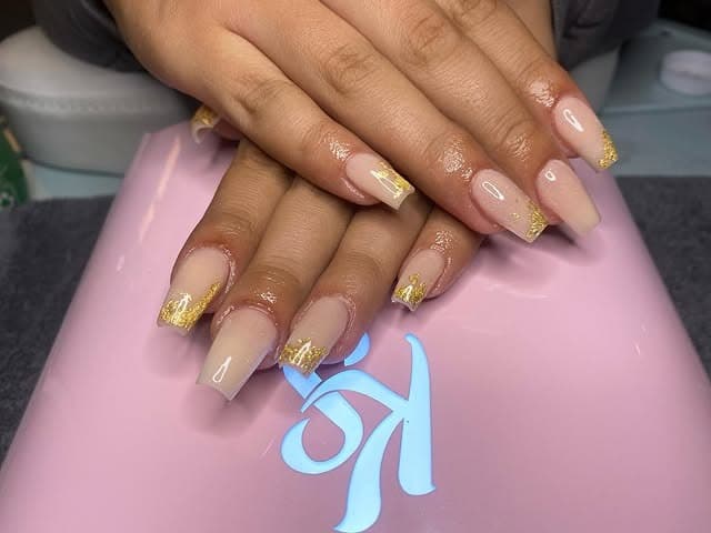 20. Nude Coffin Nails with Gold Foil Tips - gold foil nail ideas