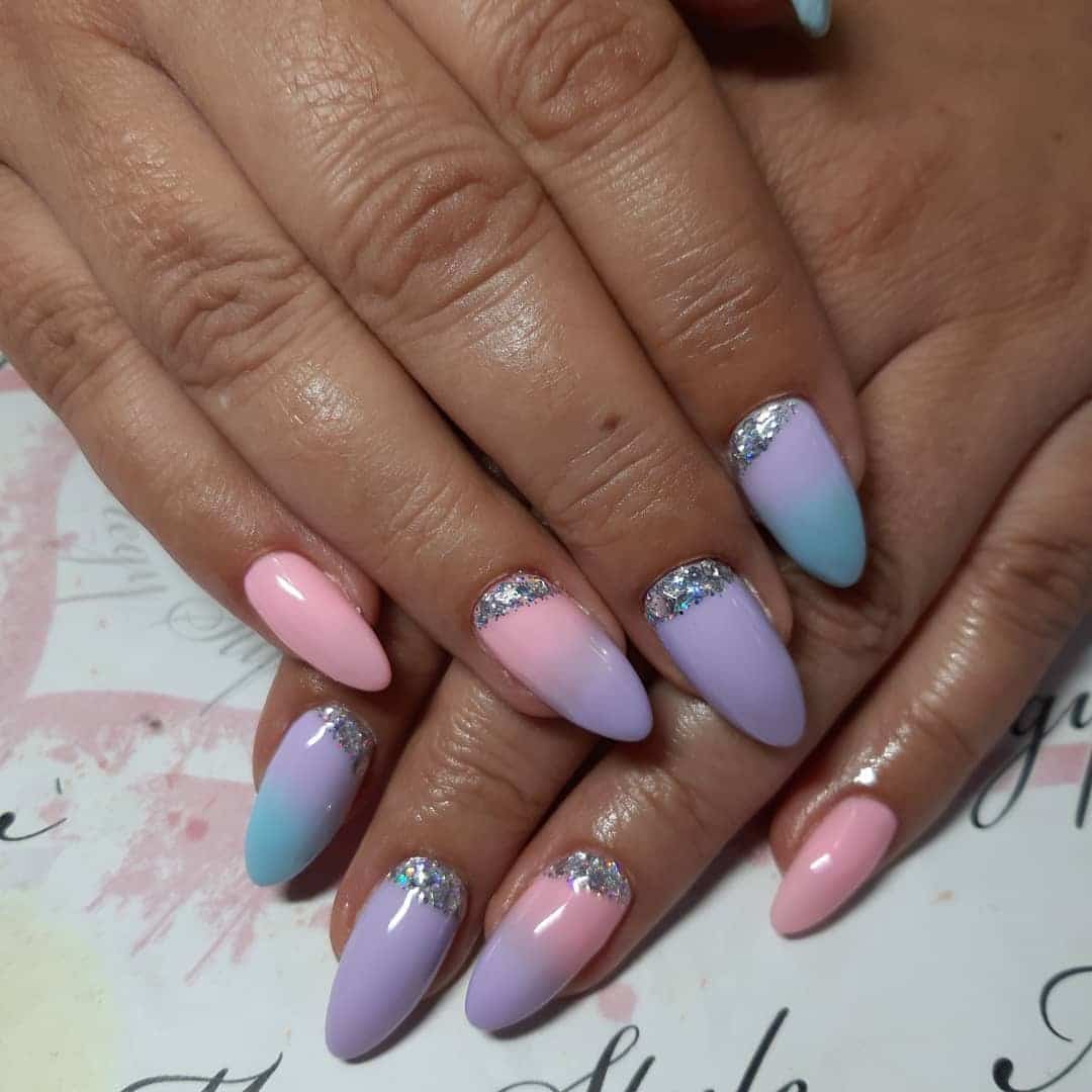 1. Soft Pastel Ombré Almond Nails with Silver Accents - gradient nail ideas