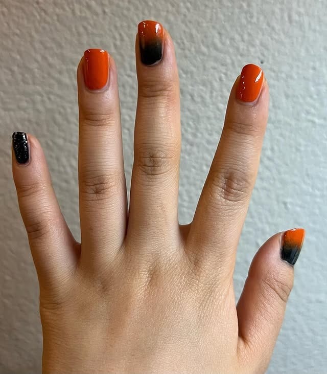 3. Burnt Orange and Black Gradient Short Nails - gradient nail ideas