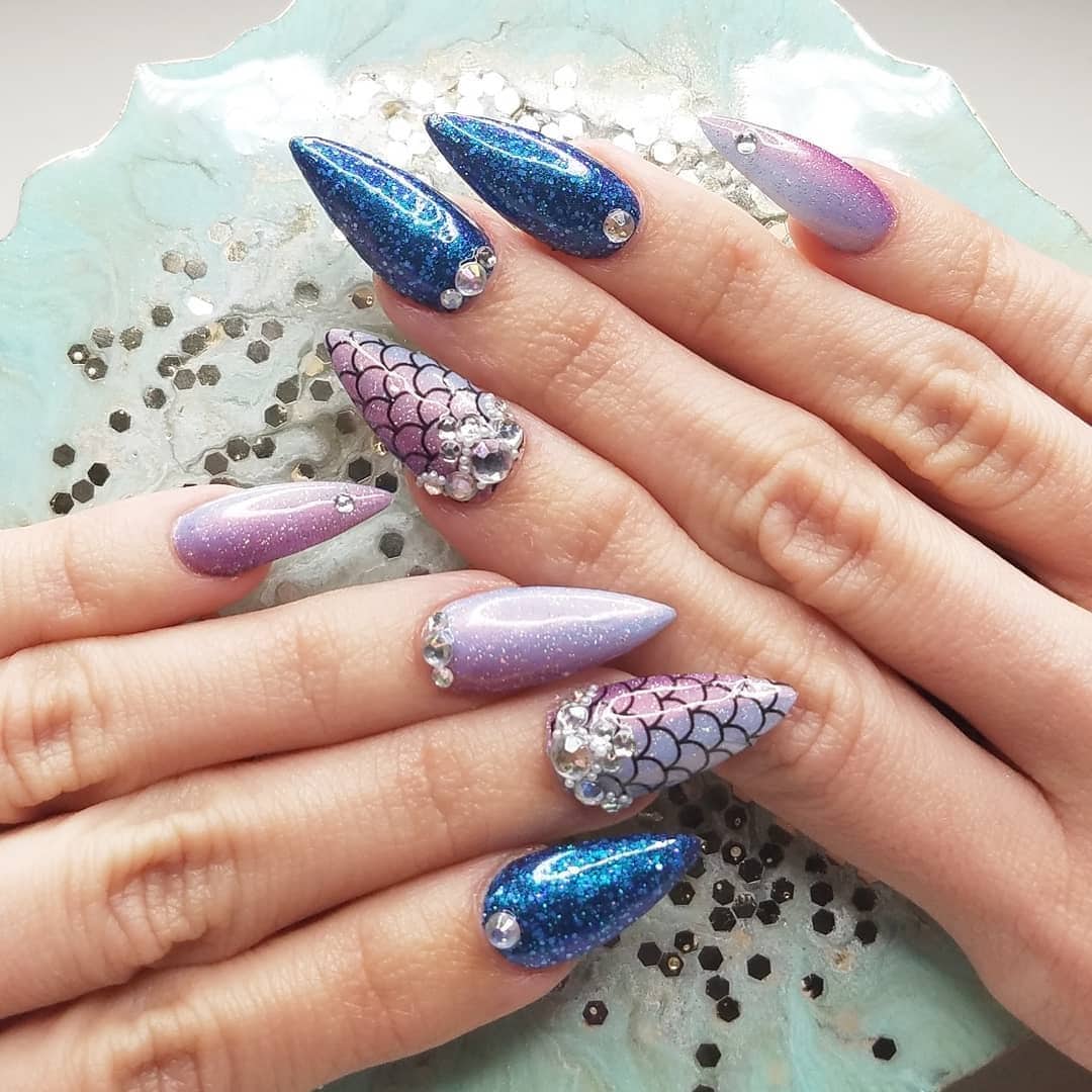 4. Jewel-Toned Gradient Stiletto Nails with Embellishments - gradient nail ideas