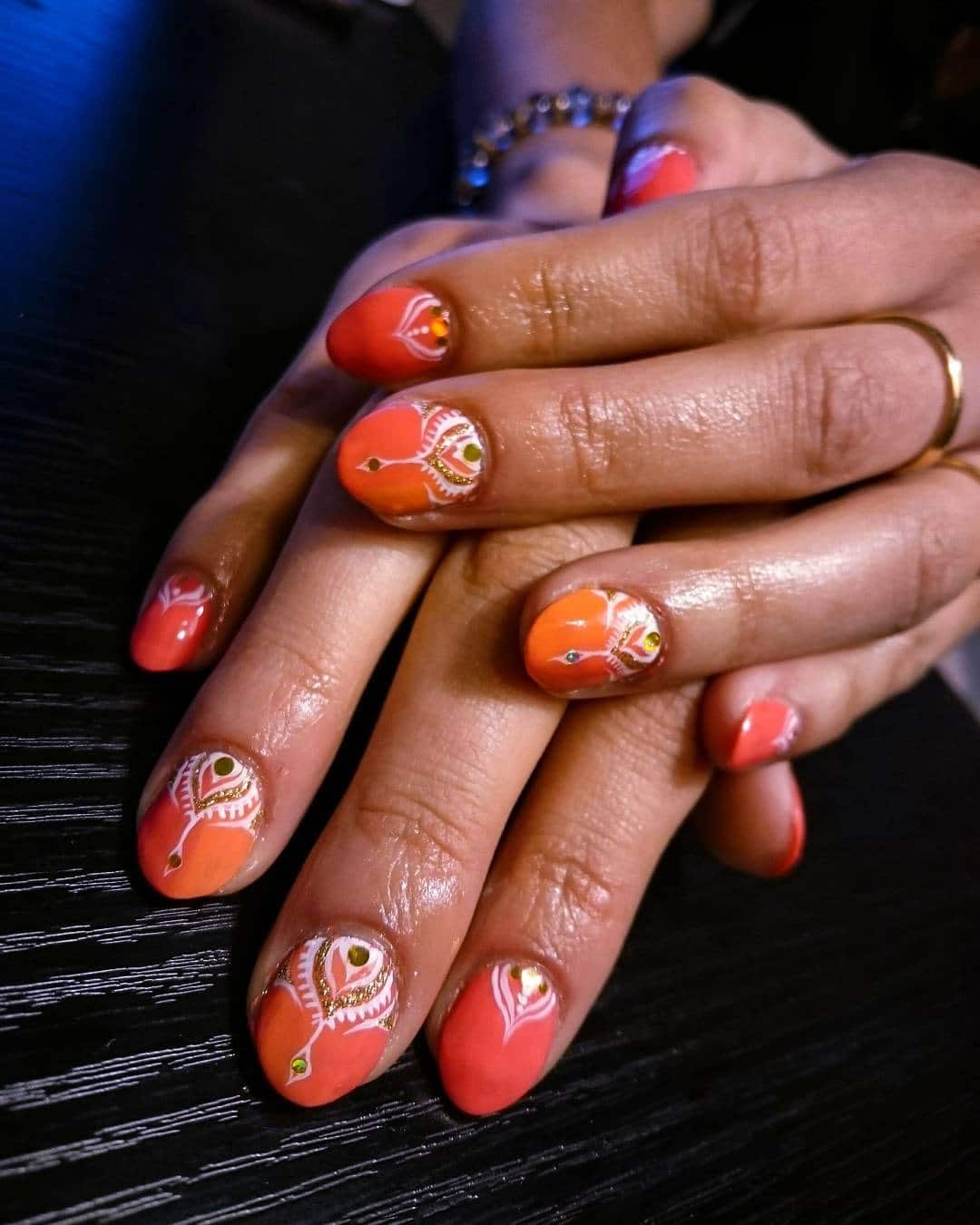 7. Coral Sunset Gradient Nails with Fine Line Art - gradient nail ideas