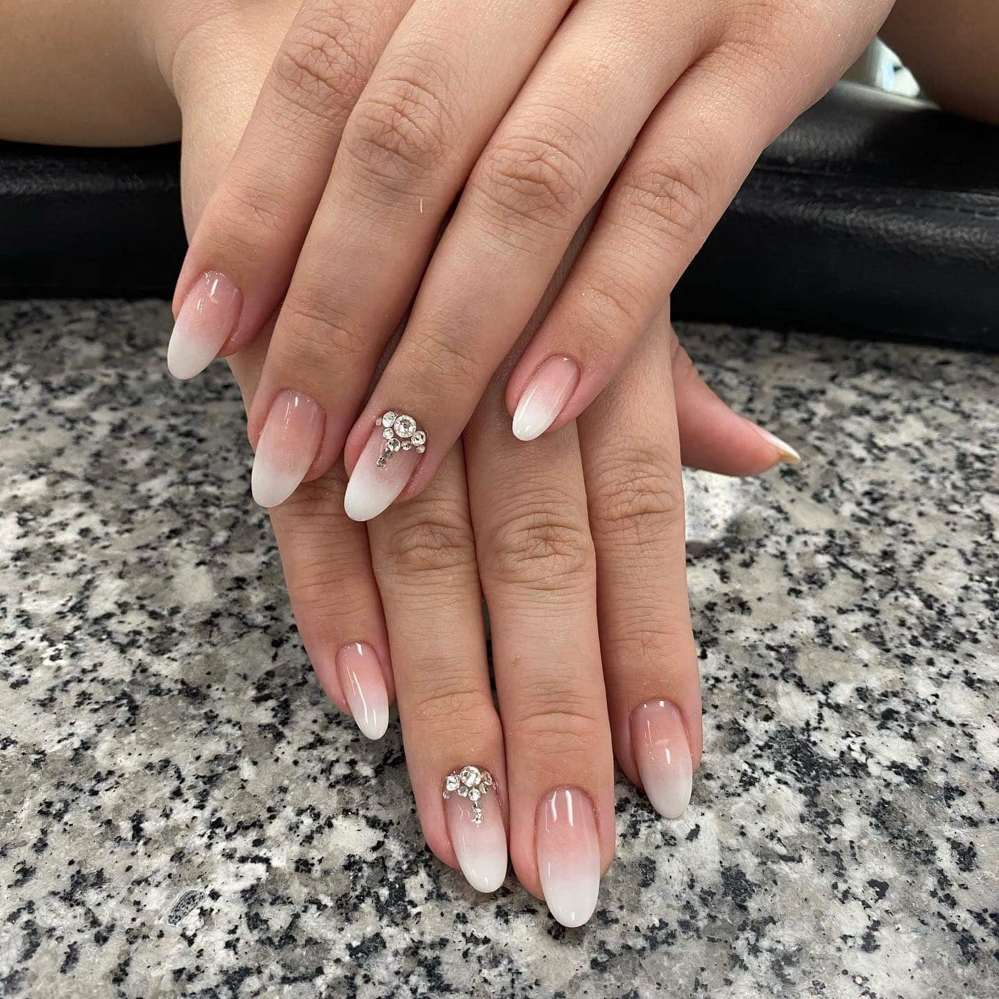 9. Classic Nude-to-White Gradient Almond Nails - gradient nail ideas