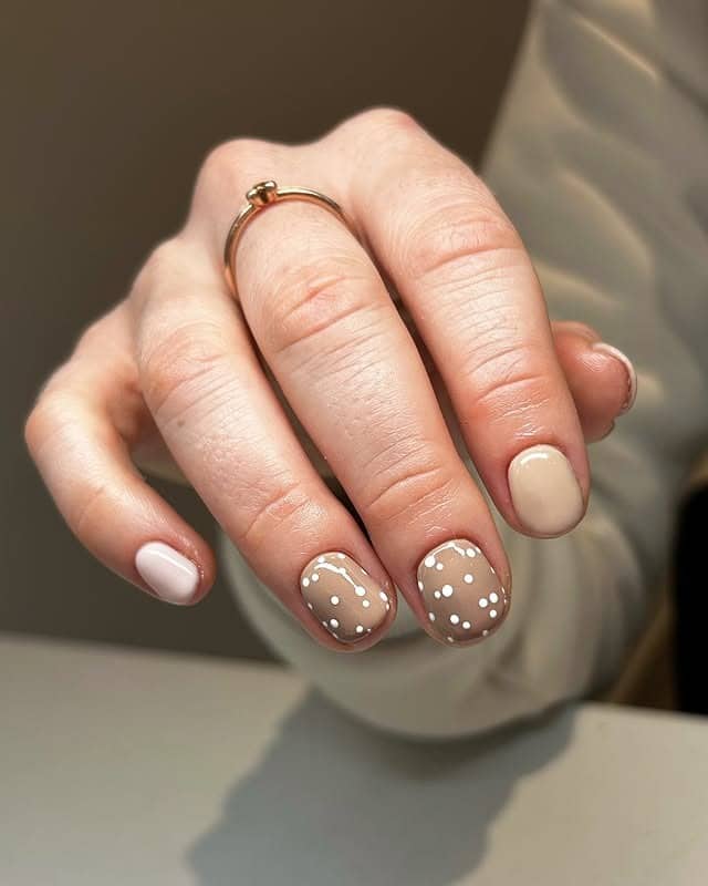 12. Neutral Beige Gradient Short Nails with Polka Detail - gradient nail ideas