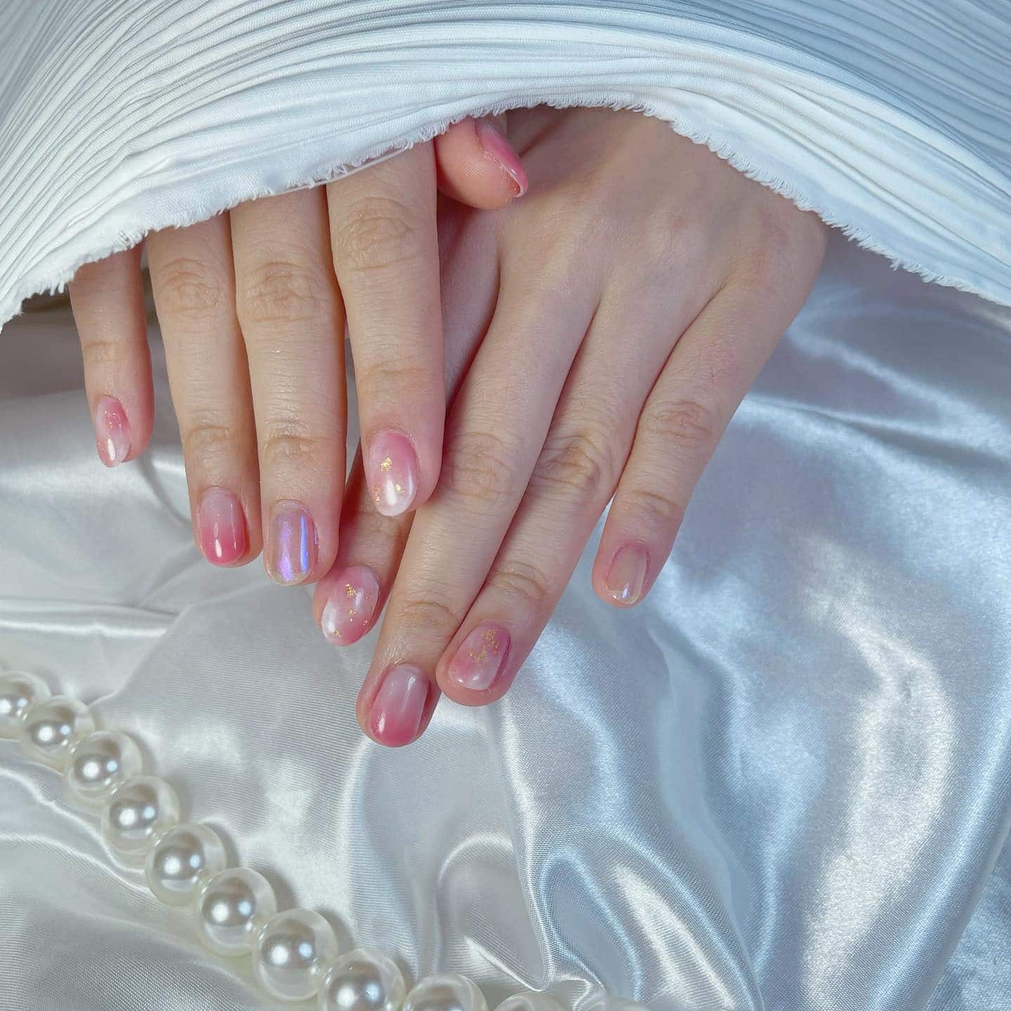 13. Sheer Pink Gradient Nails with Pearl and Gold Accents - gradient nail ideas