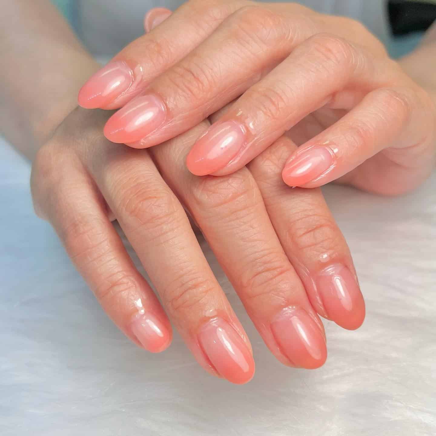14. Peach Blush Gradient Oval Nails - gradient nail ideas