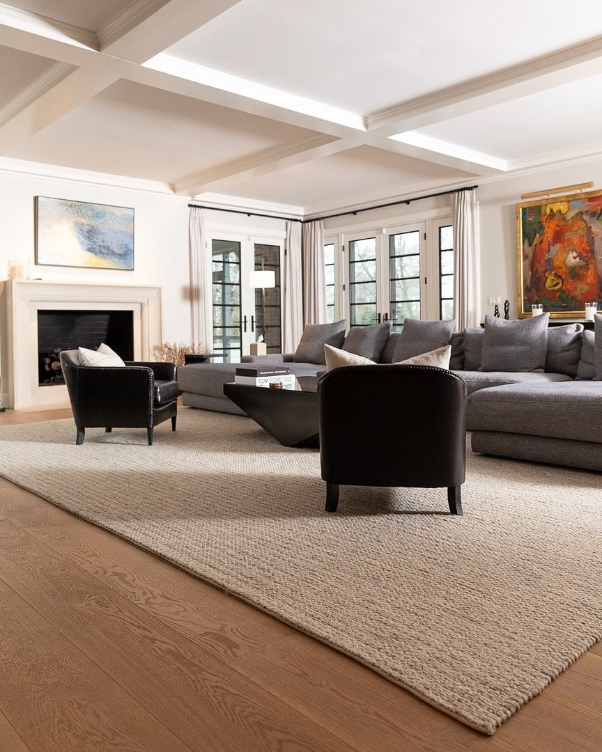 15. Classic Neutral Living Room with Beige Woven Carpet - living room carpet ideas