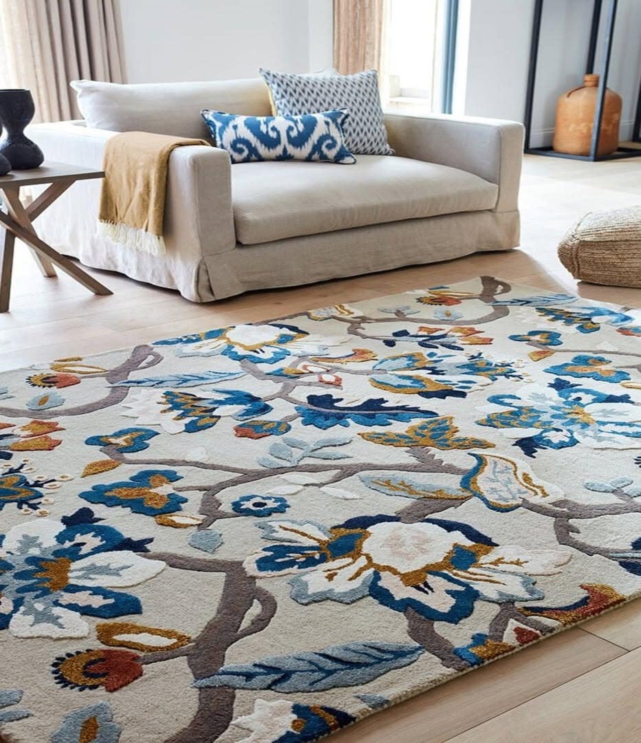 17. Casual Living Room with Floral Multicolor Carpet - living room carpet ideas