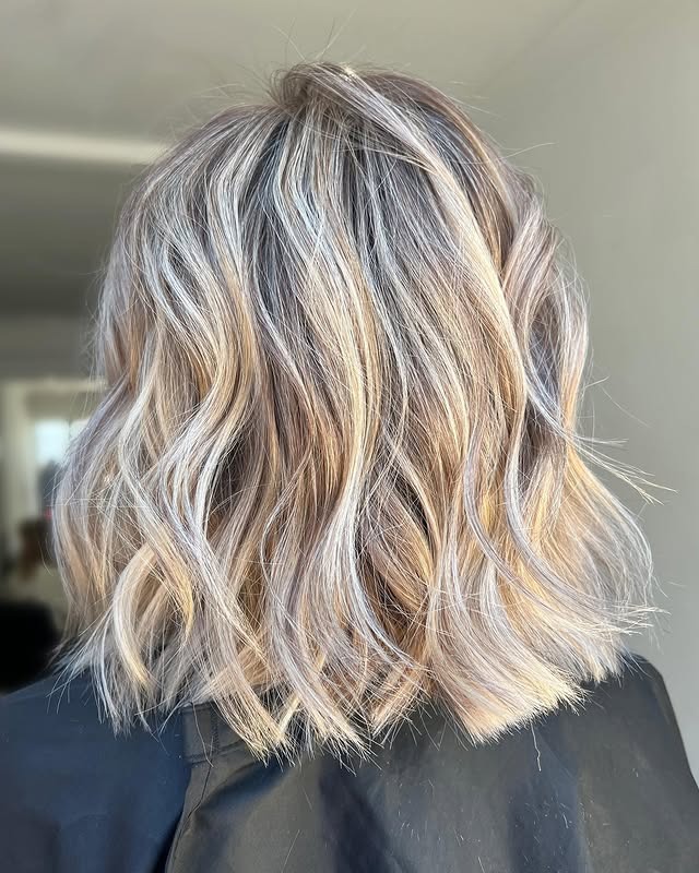 9. Cool Blonde Tousled Bob - Short Blonde Hairstyles