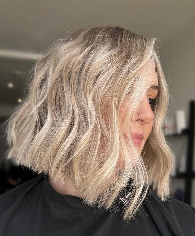 10. Soft Platinum Blonde Wavy Bob - Short Blonde Hairstyles